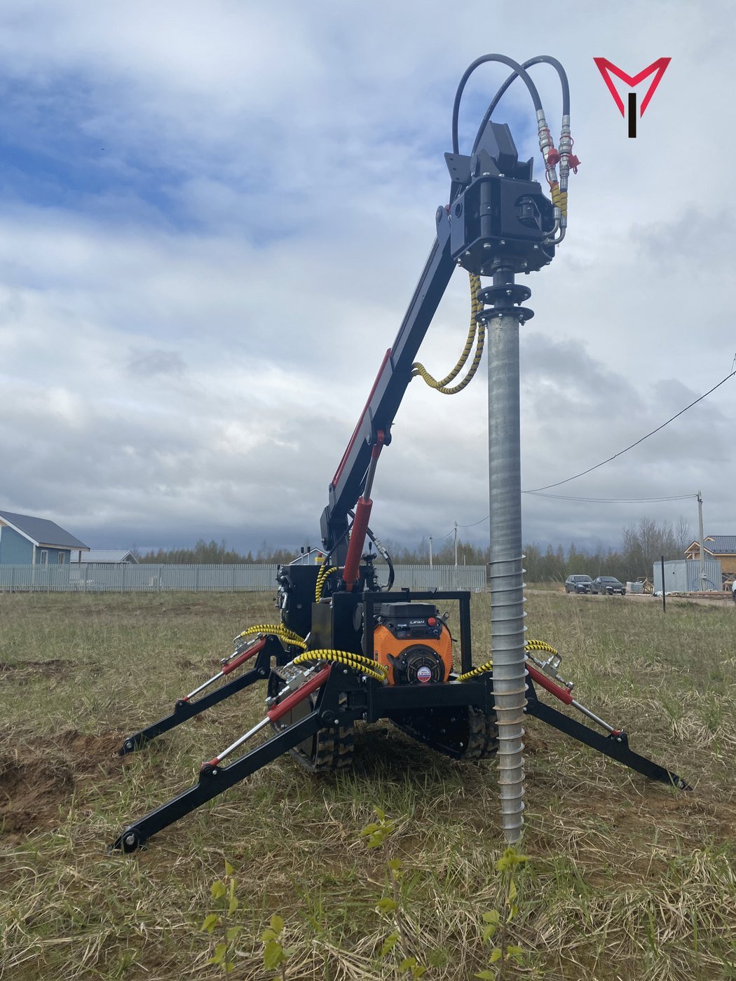 Ground screw machine is installing a ground screw
